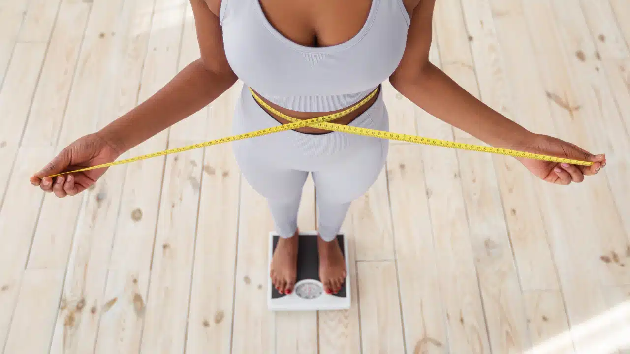 Image of a Patient Measuring Her Waist at Nords Weight Loss Clinic