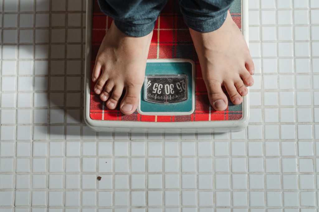A Nords Weight Loss Clinic Client Weighing Themselves